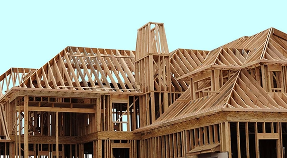 Roof framing installation in Munster, IN ensuring weather-resistant roofing foundations.
